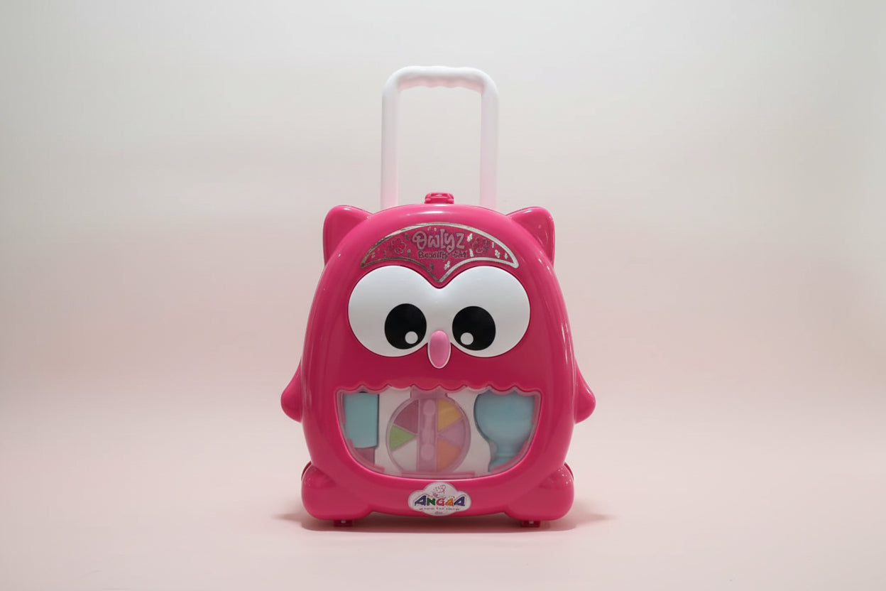 Pink owl-shaped suitcase with a clear front panel on a white background
