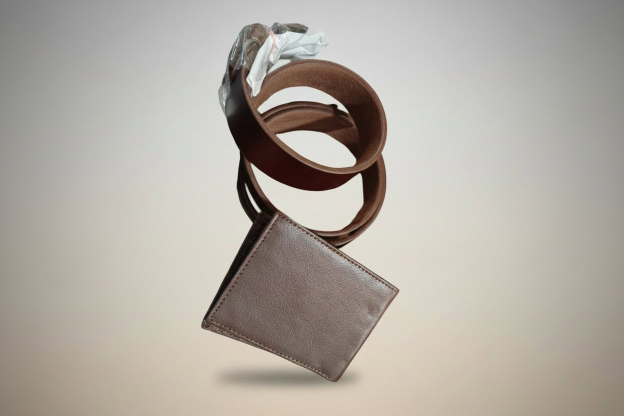 Brown leather wallet and belt on a gradient background