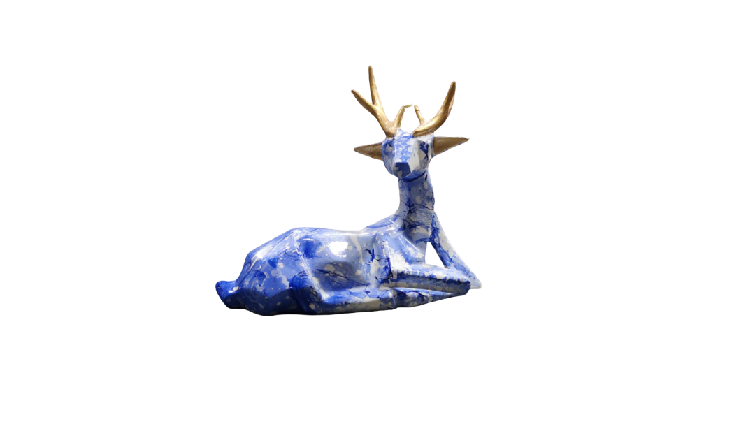 Blue deer figurine on a white background