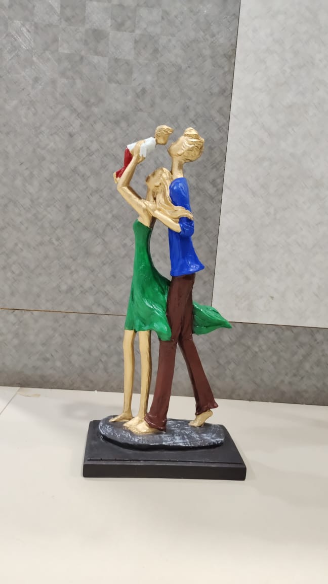 Decorative Family With One Kid Resin Figurine Multi Color