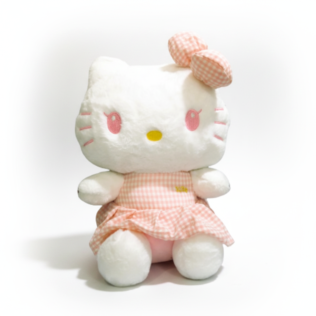 A plush Hello Kitty toy with a pink bow and a checkered dress.