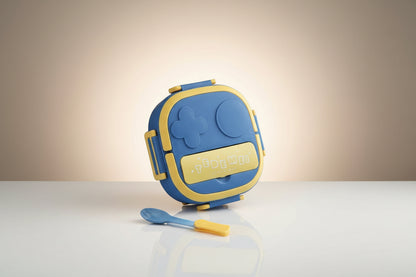 A stainless steel lunch box with blue and yellow colors, featuring a soft fabric lunch carrier with a zipper and a spoon.
