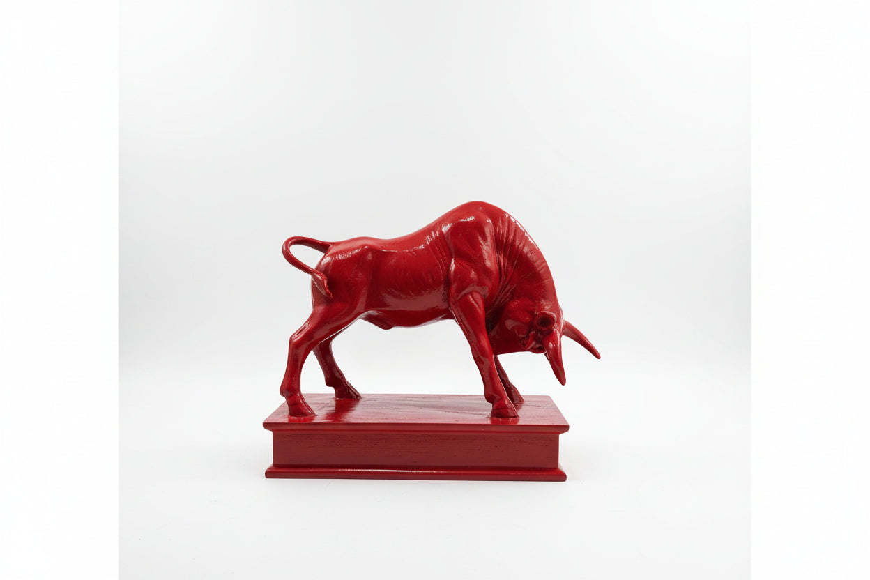 Red bull statue on a white background