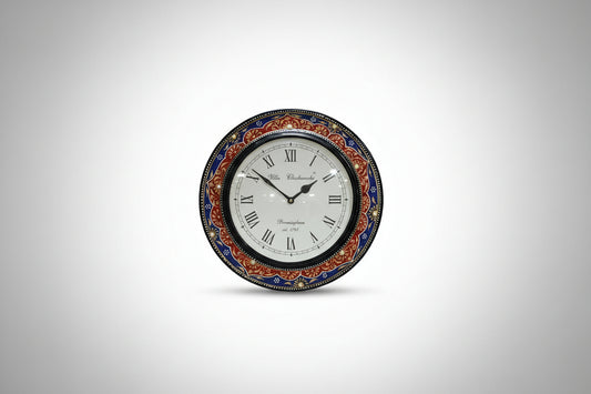Decorative wall clock with Roman numerals and colorful border on a white background