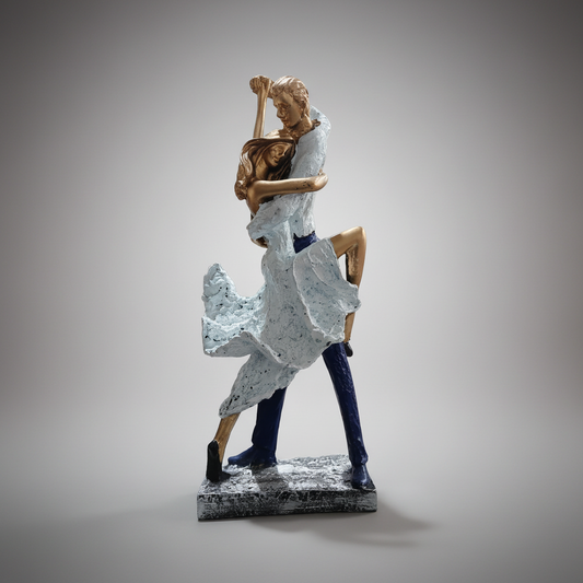 A white Tango dancing couple statue made of polyresin, featuring a man and a woman in a dynamic dancing pose.