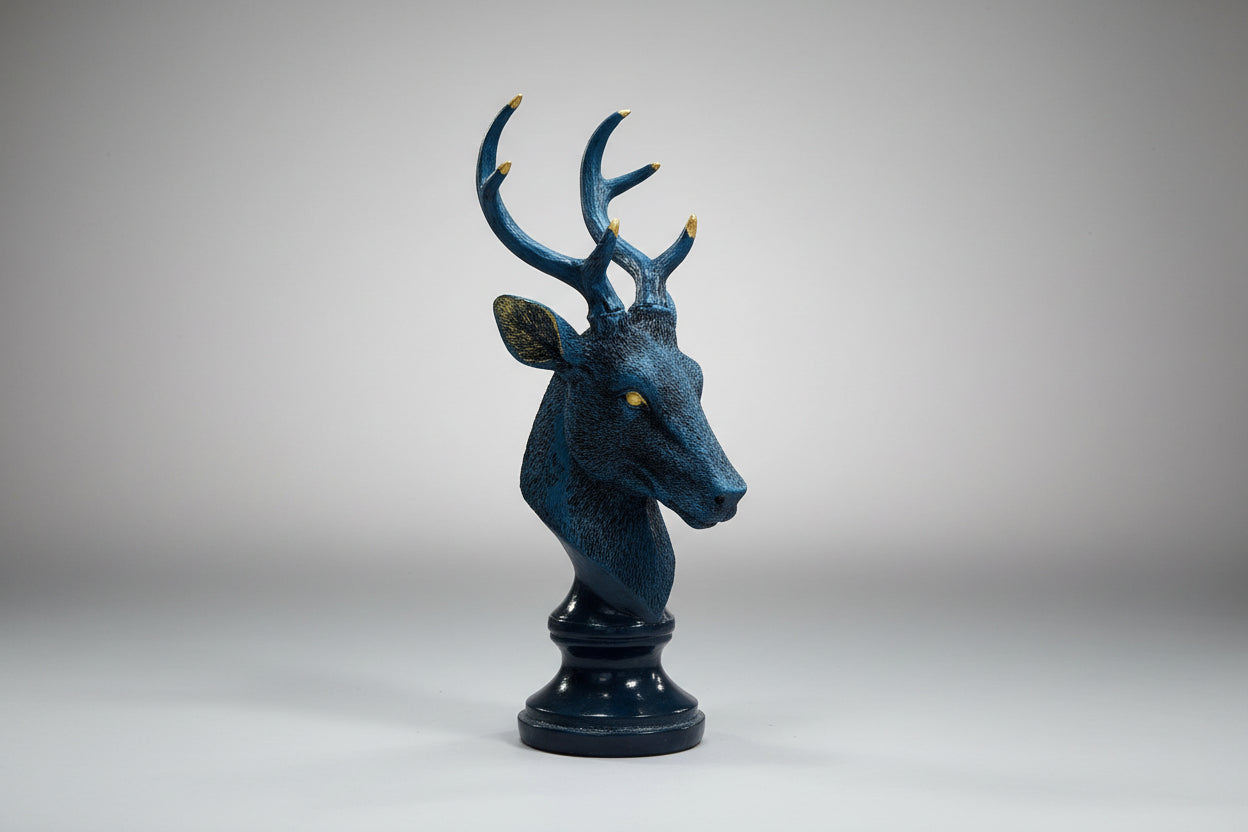 Decorative deer head sculpture on a white background