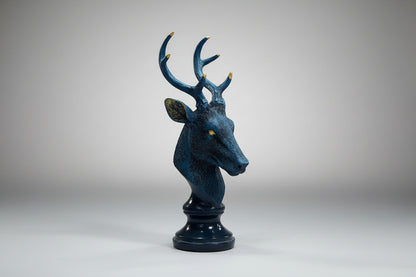 Decorative deer head sculpture on a white background