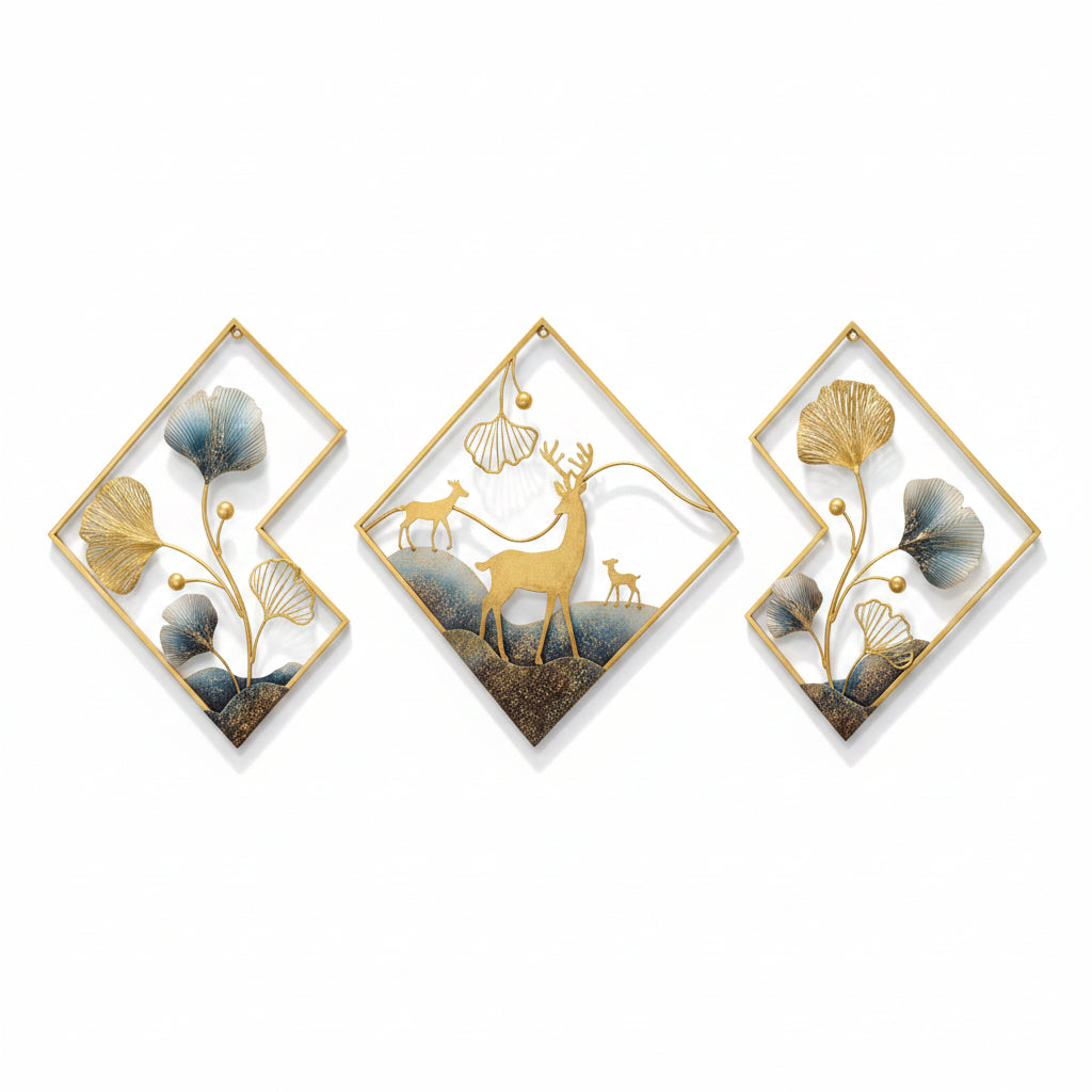A set of three abstract multicolor metal wall sculptures featuring deer designs, displayed above a sofa with orange and blue cushions in a living room setting.