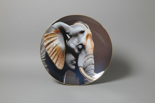 A decorative plate featuring a close-up image of an elephant with a glossy finish.