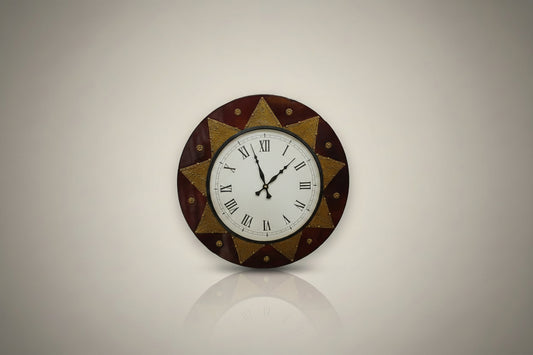 Round wall clock with decorative border on a white background
