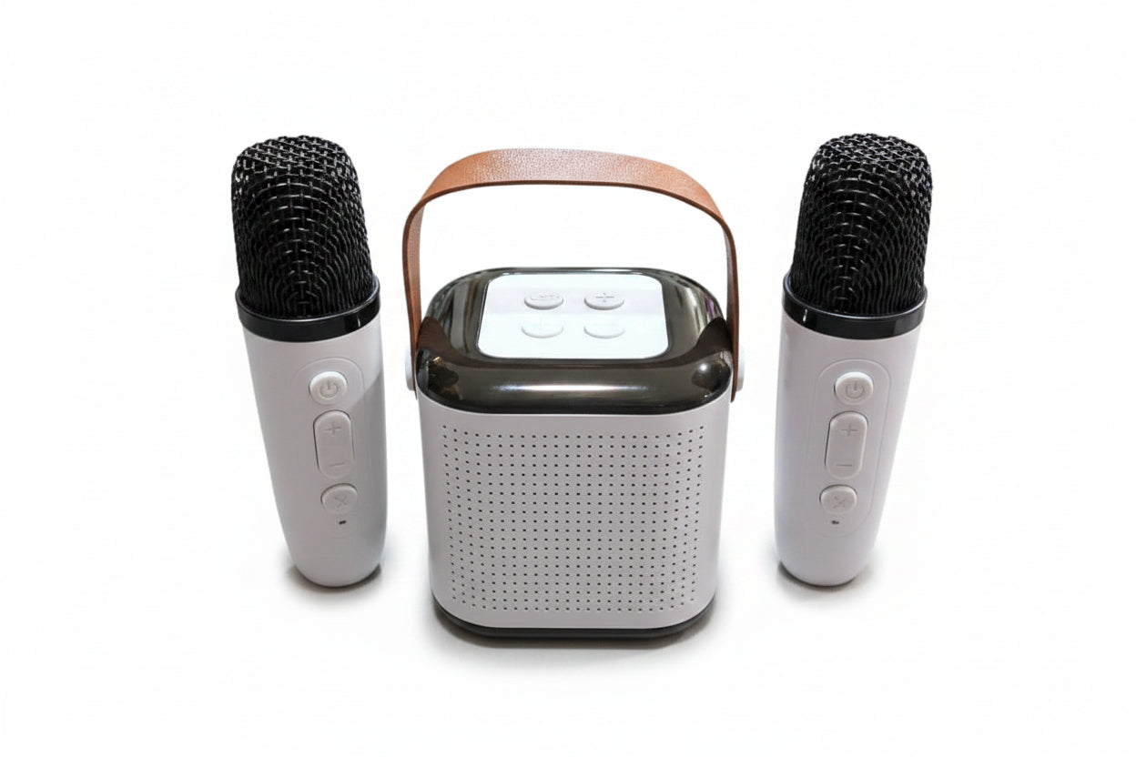 Portable speaker with two microphones on a white background