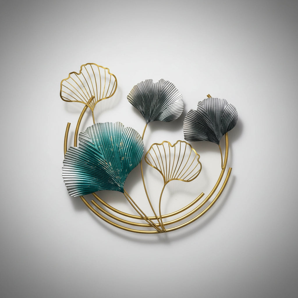 A set of three golden ginkgo leaf designs with frames, ready for hanging on a wall.