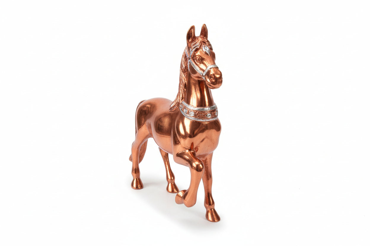Copper horse figurine with a white background