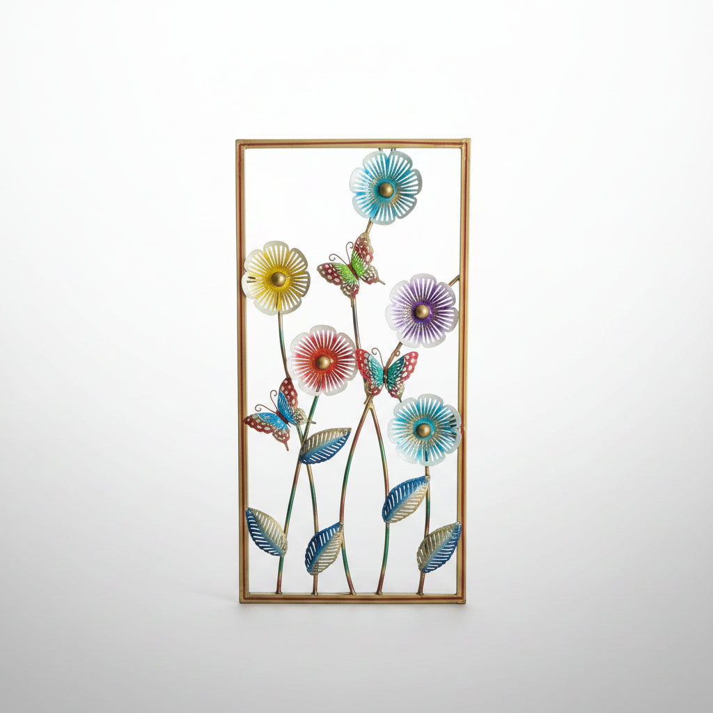 A set of colorful handcrafted metal showpieces depicting traditional Rajasthani figures, displayed on a marble surface.
