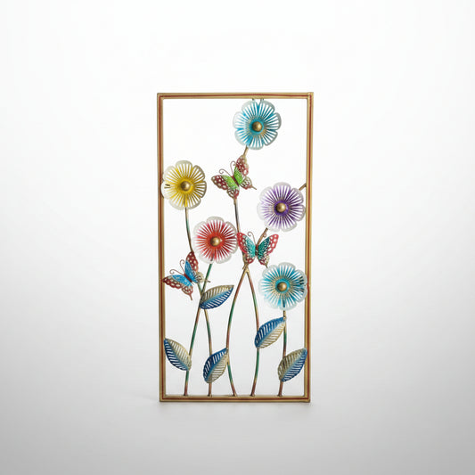 A set of colorful handcrafted metal showpieces depicting traditional Rajasthani figures, displayed on a marble surface.
