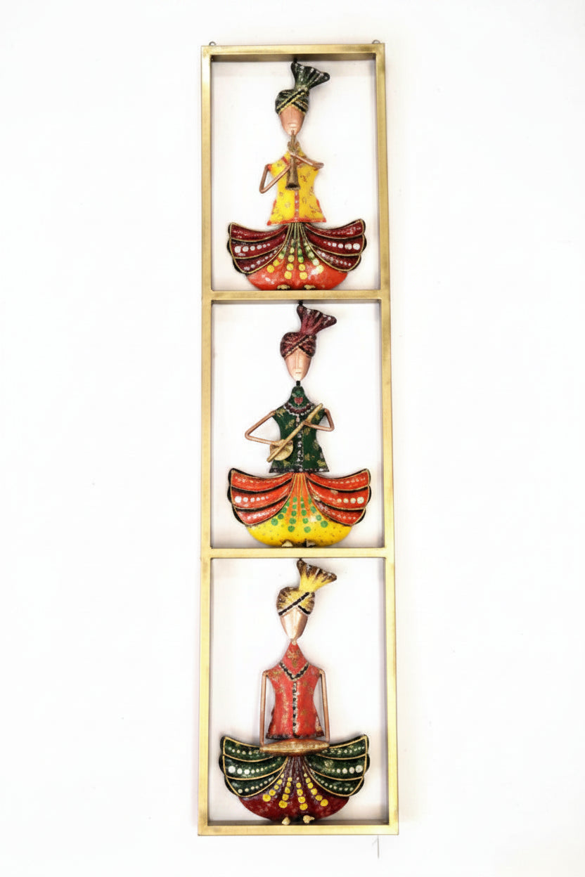 A wall decor frame featuring three Sardar musician figures, each holding a traditional musical instrument, set against a gold background.