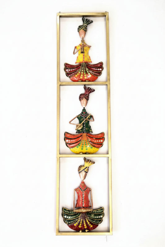 A wall decor frame featuring three Sardar musician figures, each holding a traditional musical instrument, set against a gold background.