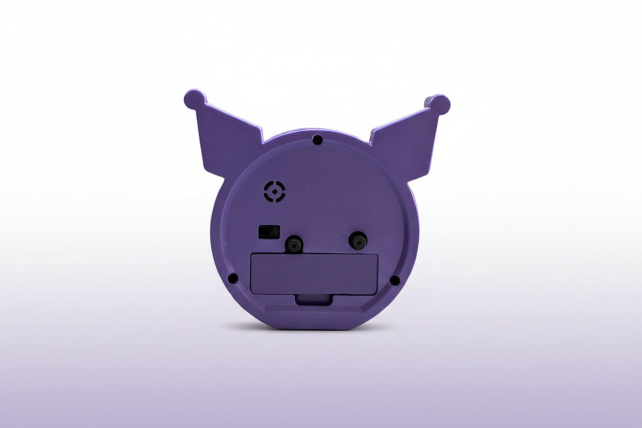 Purple plastic component with animal ears on a white background