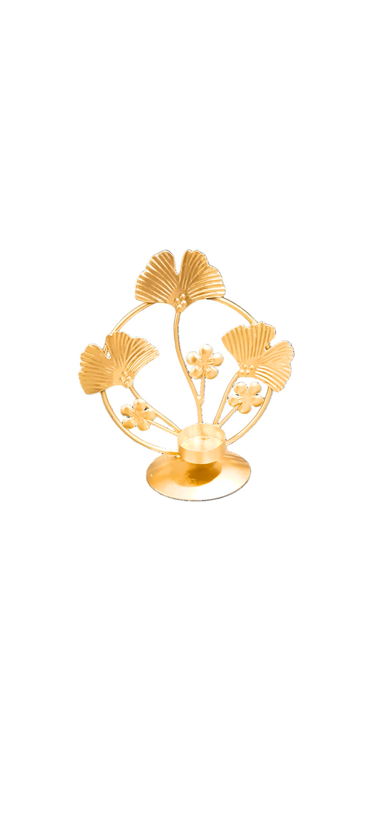 Gold decorative item with leaf design on a white background