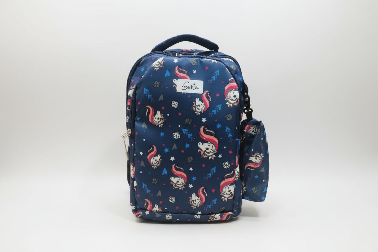 A blue school bag with character patterns and a small pouch attached to it.