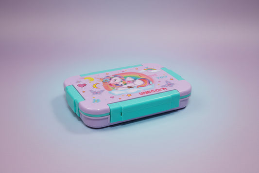 A purple insulated lunch box with a cartoon unicorn, rainbows, and clouds design, alongside colorful decorative elements like hearts and stars.