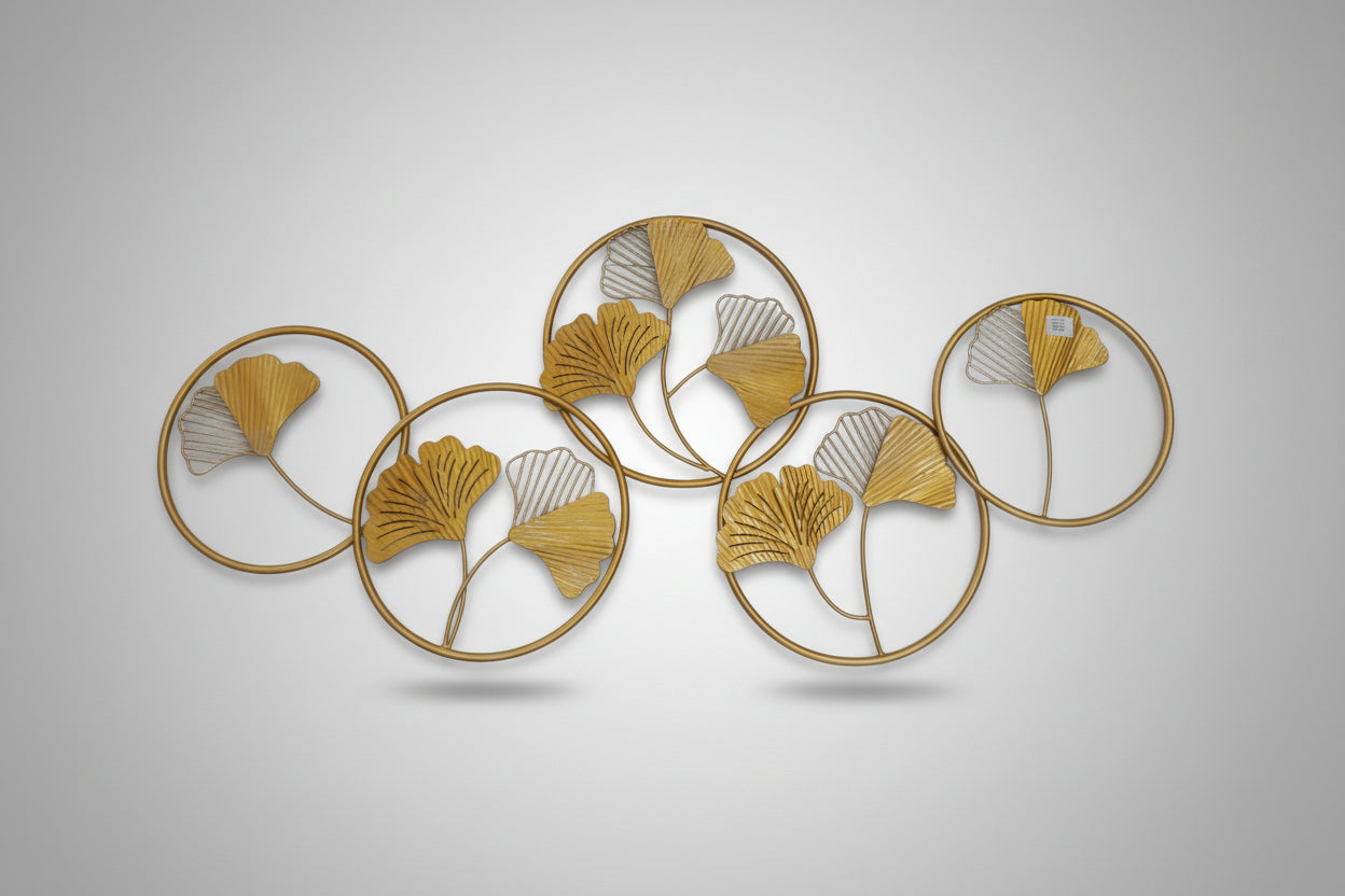 A 3D metal wall decoration featuring multiple overlapping circles with a gold finish.