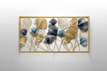 A wall-mounted wrought iron art piece with floral patterns in black, gold, and gray colors, displayed above a sofa with decorative pillows and a vase.