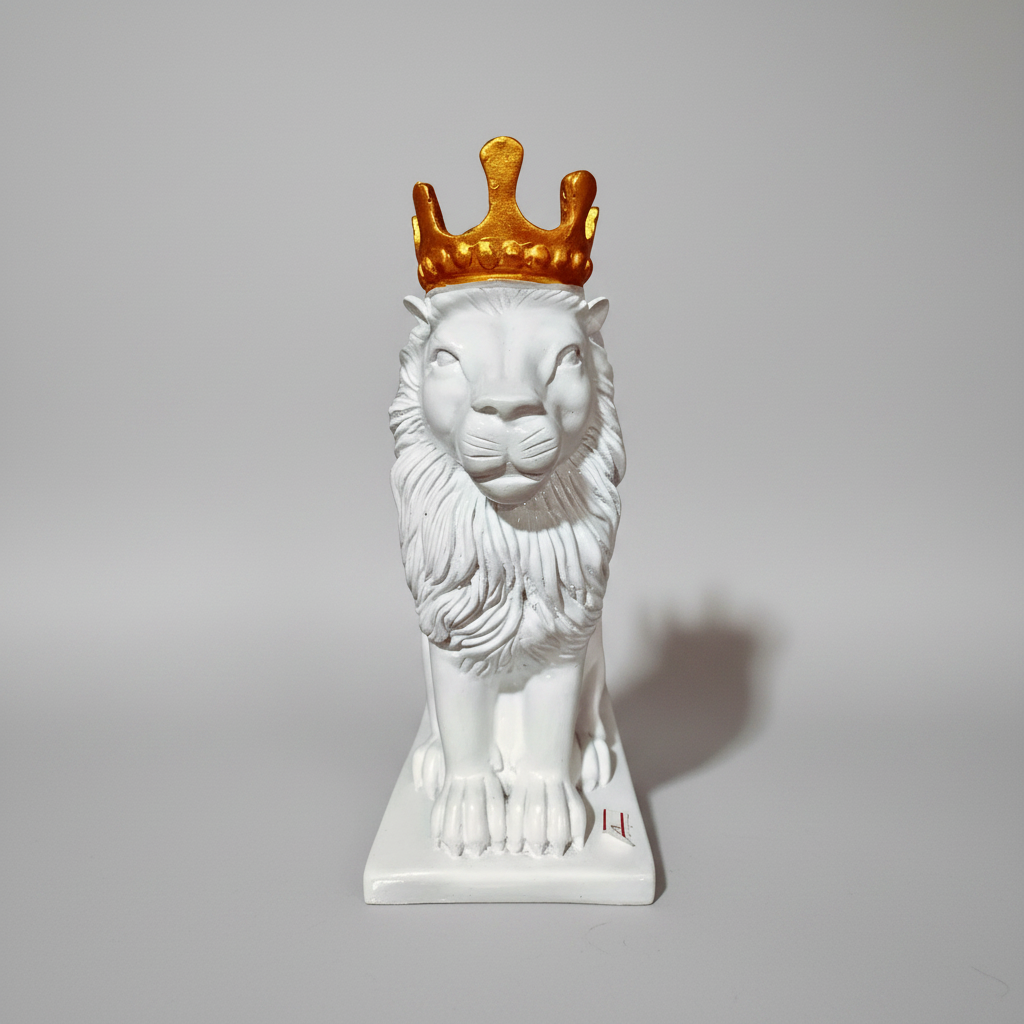 A white decorative polyresin statue of a lion wearing a golden crown, set against an orange and gold background with a Greek key design.