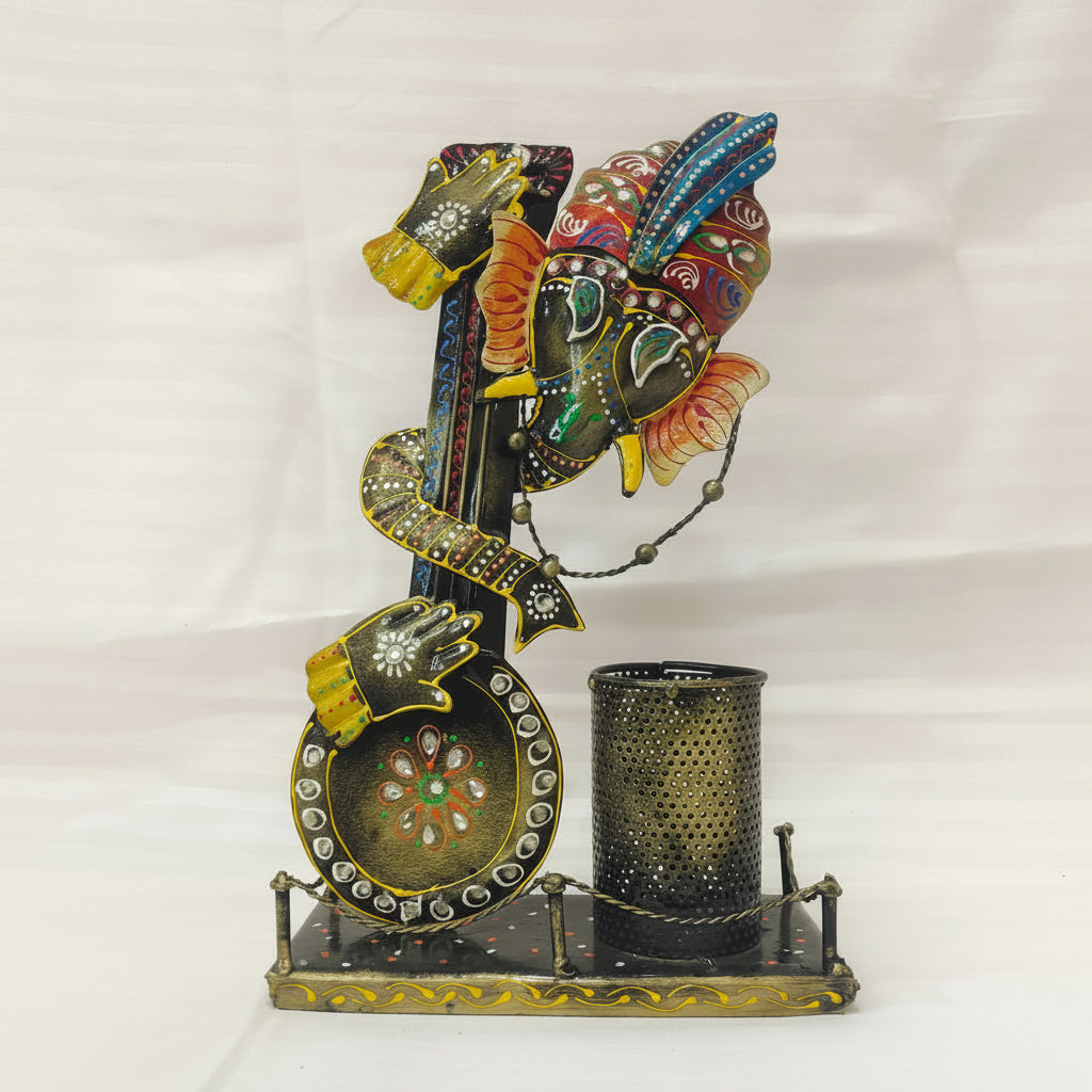 Decorative metal sculpture with colorful elements on a white background